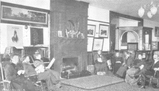Guests gathered around a cheery fireplace